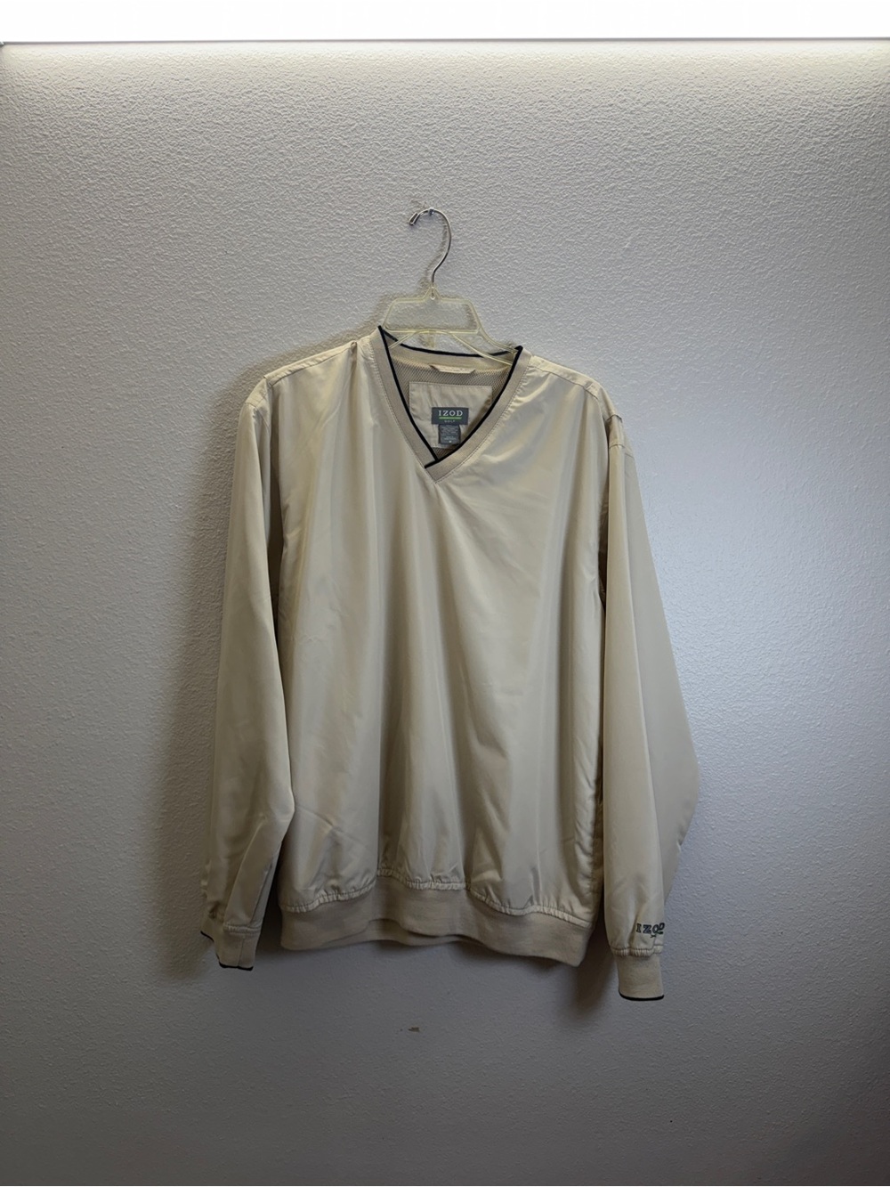 Izod Beige Windbreaker with Black Trim and Green Logo Accent